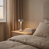 Halden Cordless Bar Lamp on a bedside table