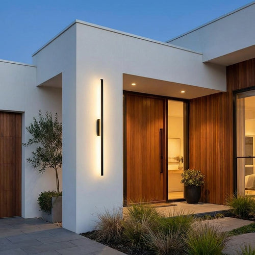 LED Outdoor Wall Lamp - modern home exterior at dusk