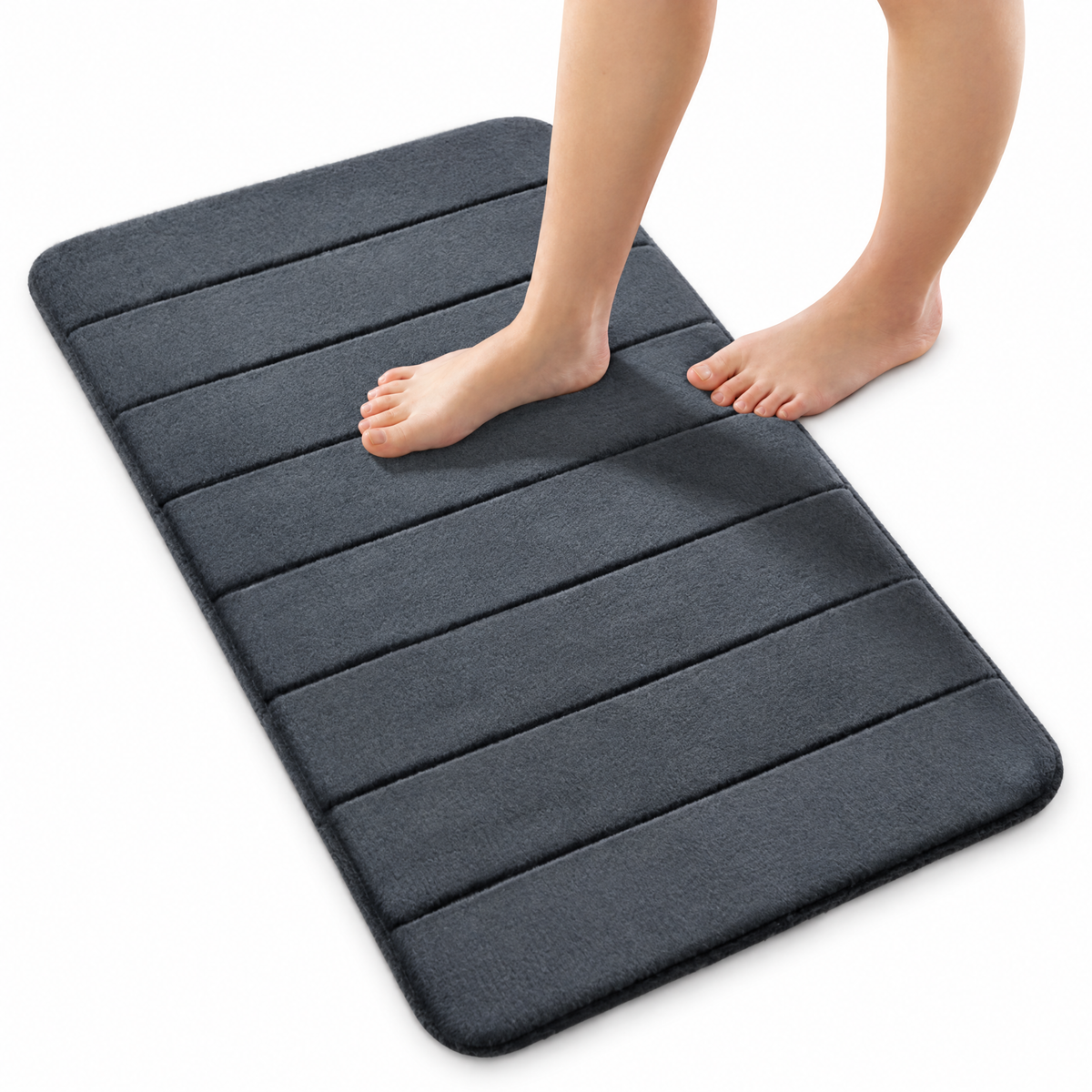 Plush anti-slip bath mat in dark grey on white background