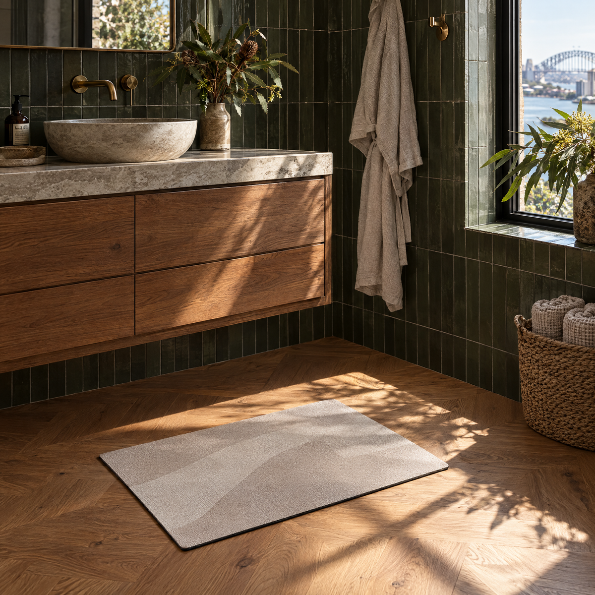 Taupe wave pattern quick-dry bath mat in a green-tiled bathroom