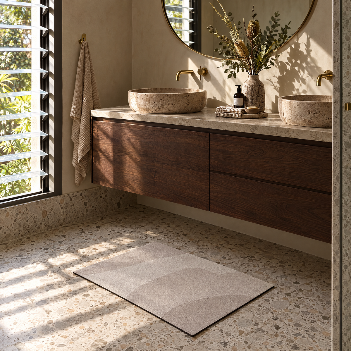 Taupe wave pattern quick-dry bath mat in front of a double vanity