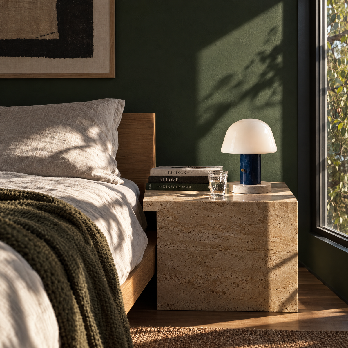 Blue mushroom table lamp on a bedside table
