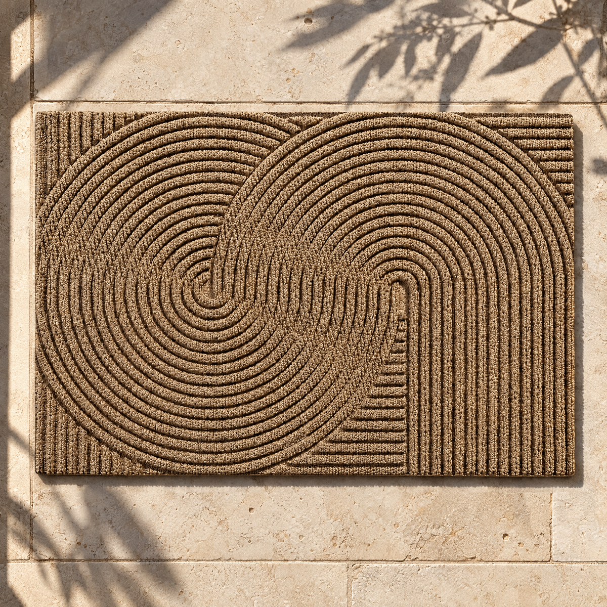 Khaki non-slip door mat on sunlit limestone porch pavers