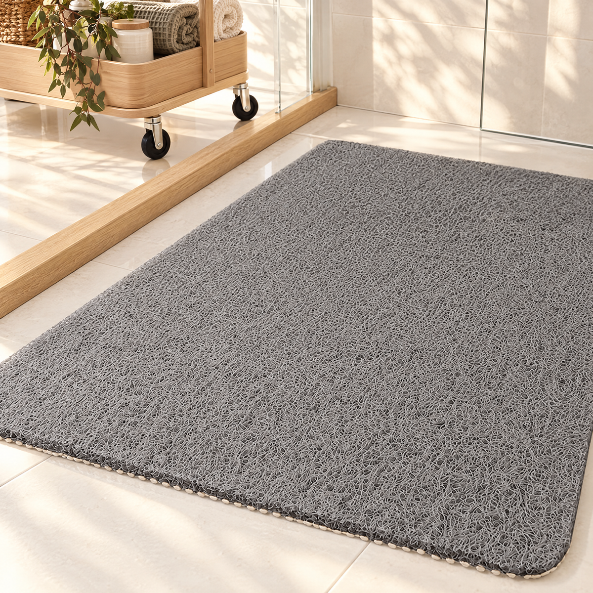 Quick-drain non-slip shower mat in a bathroom