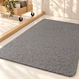 Quick-drain non-slip shower mat in a bathroom