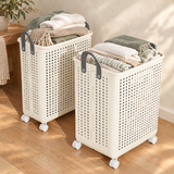 Foldable rolling laundry baskets with linen on an oak floor