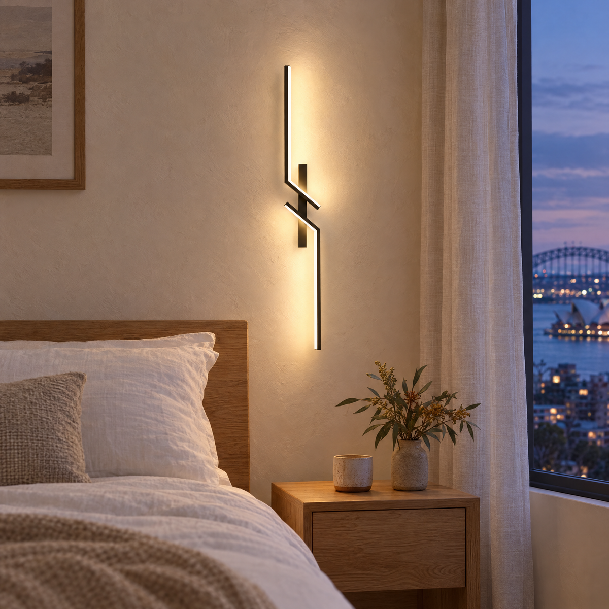 Linje LED wall lamp glowing beside a bed