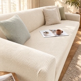 Vakt cream stretch sofa protector cover