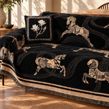 Horse print chenille couch cover close-up on a sofa